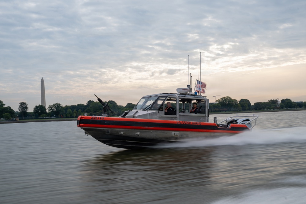 U.S. Coast Guard patrol boat conducts security operations on the Potomac River near the Washington Monument