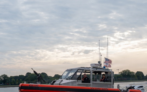 U.S. Coast Guard patrol boat conducts security operations on the Potomac River near the Washington Monument