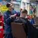 Ronald Reagan Sailors Visit the Barbershop