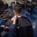 Ronald Reagan Sailors Visit the Barbershop