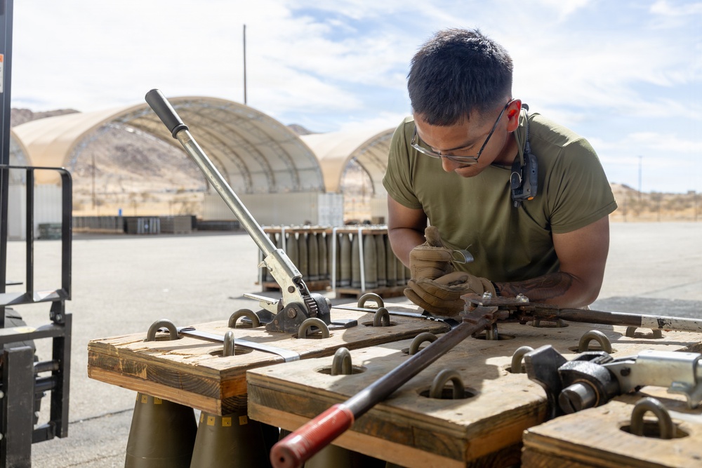 Headquarters Battalion sorts through ammo for 2/5 at Combat Center