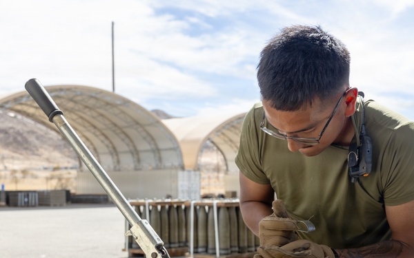 Headquarters Battalion sorts through ammo for 2/5 at Combat Center