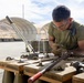 Headquarters Battalion sorts through ammo for 2/5 at Combat Center
