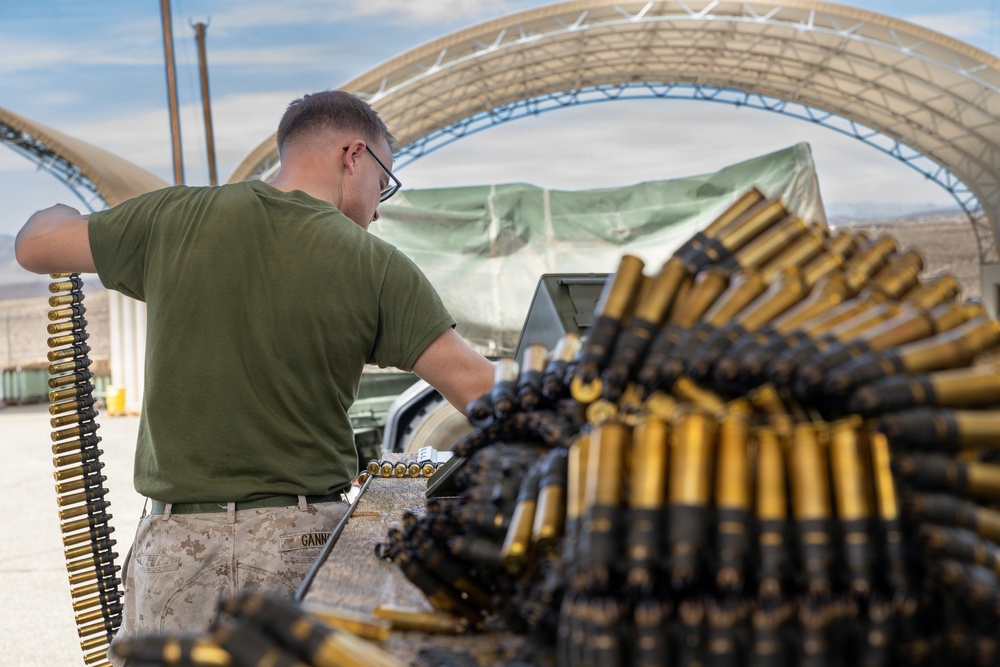 Headquarters Battalion sorts through ammo for 2/5 at Combat Center