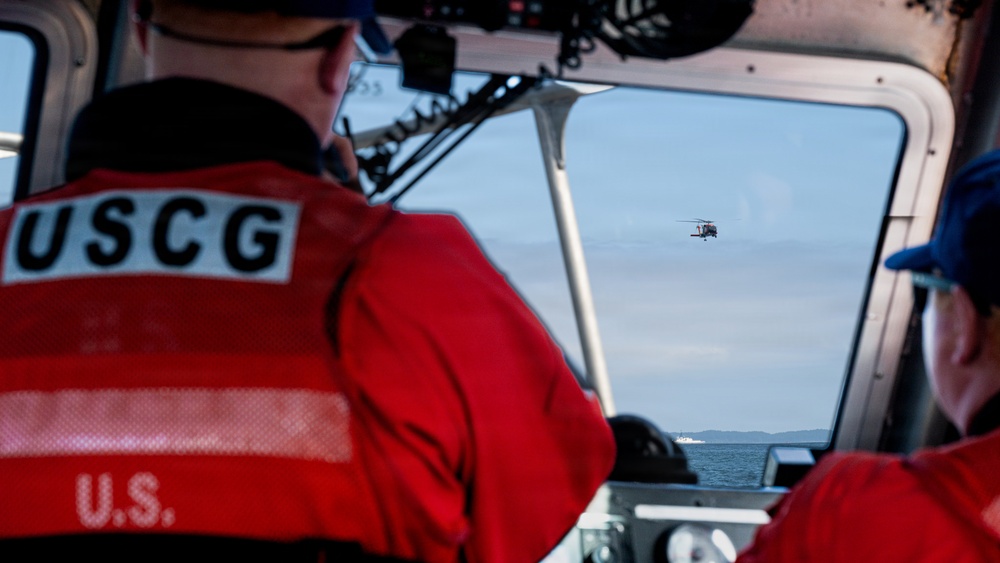 Coast Guard members conduct search and rescue exercise during leadership visit in Kodiak