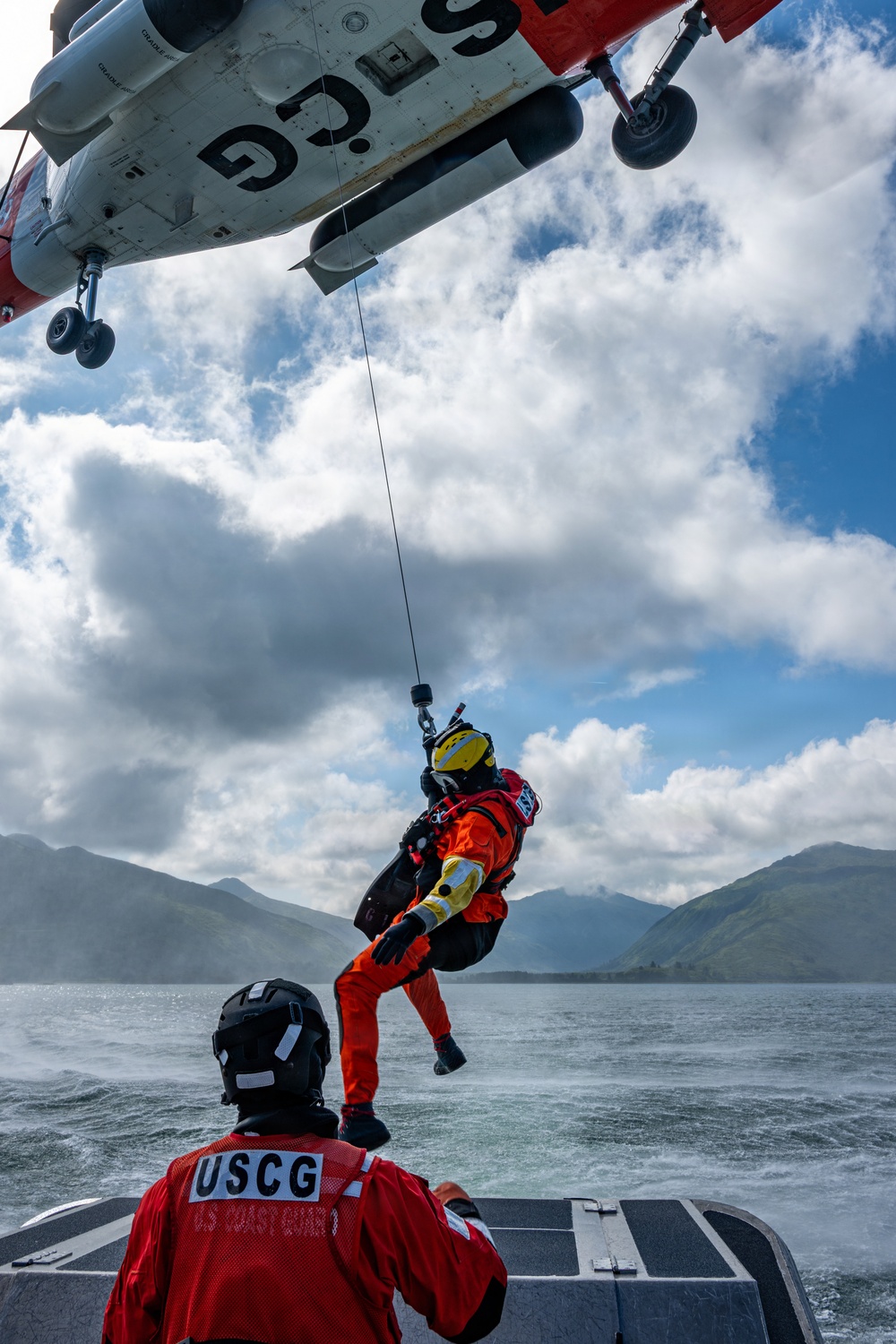Coast Guard members conduct search and rescue exercise during leadership visit in Kodiak