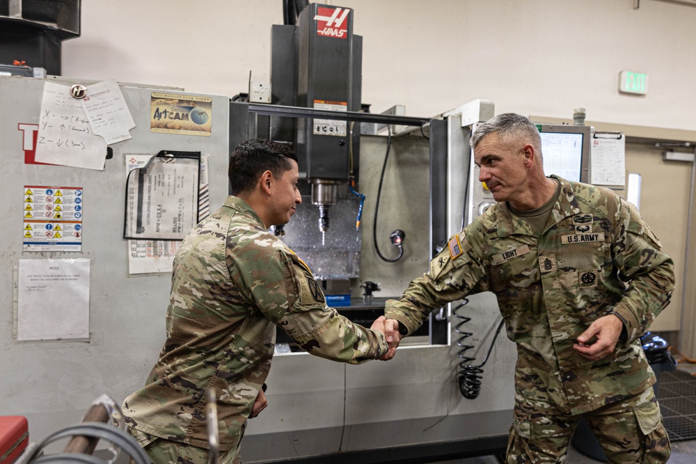III Armored Corps Command Sergeant Major Shakes Hands with 100th BSB NCOIC