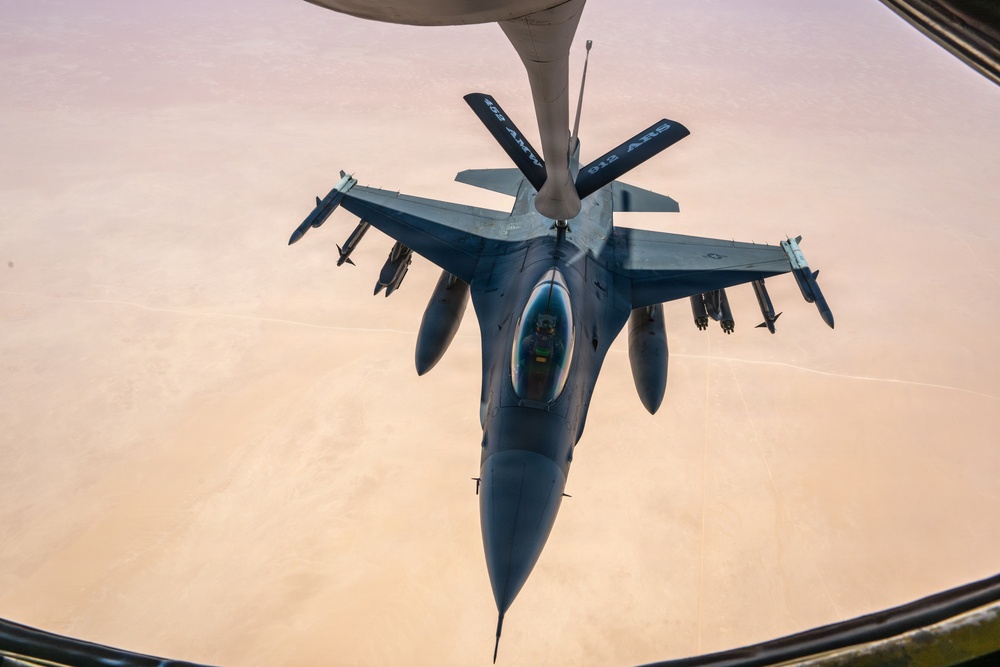 KC-135 refuels F16s for theater stability