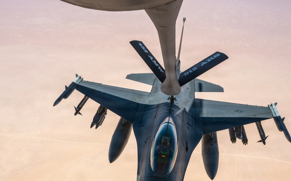 KC-135 refuels F16s for theater stability