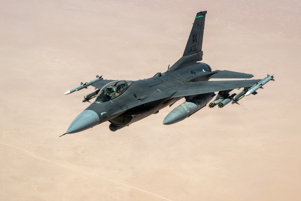 KC-135 refuels F16s for theater stability