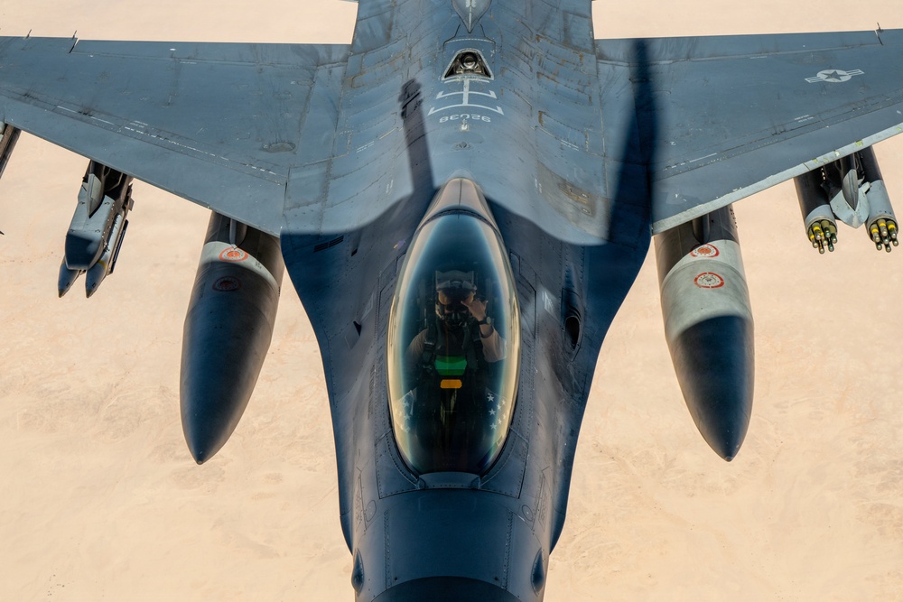 KC-135 refuels F16s for theater stability