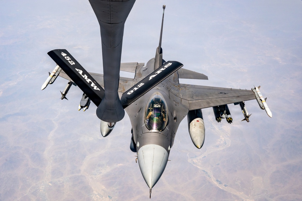 KC-135 refuels F16s for theater stability