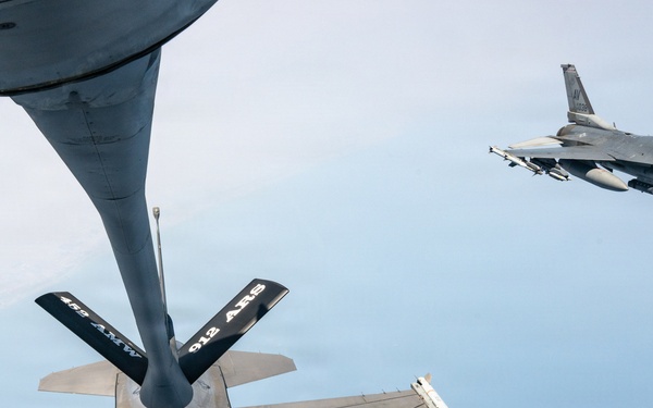 KC-135 refuels F16s for theater stability