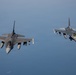 KC-135 refuels F16s for theater stability