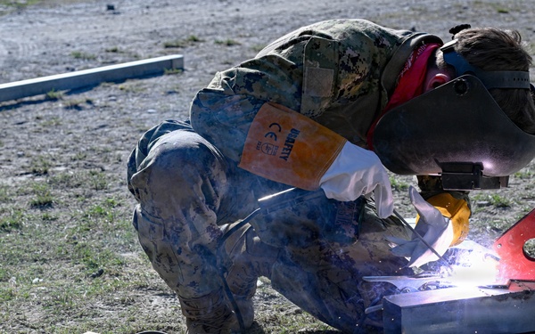 U.S. Navy Seabees upgrade infrastructure at the Escola Básica Filial Kasnafar engineering site during Pacific Partnership 2026 in Dili, Timor-Leste