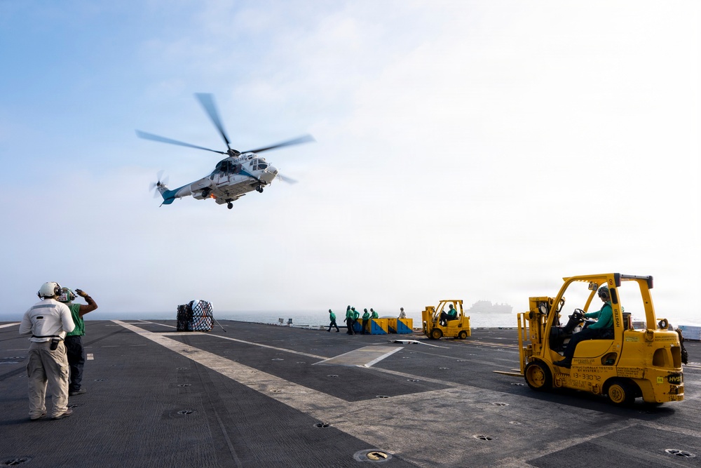 USS George Washington Conducts a Replenishment-At-Sea