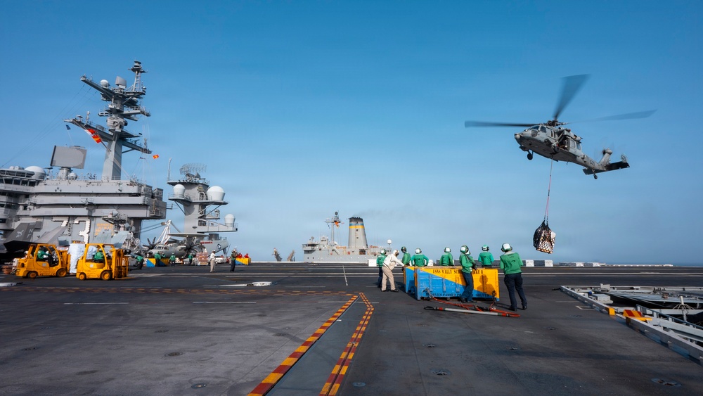 USS George Washington Conducts a Replenishment-At-Sea