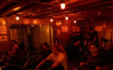 USS Carl Vinson (CVN 70) Sailors participate in physical training