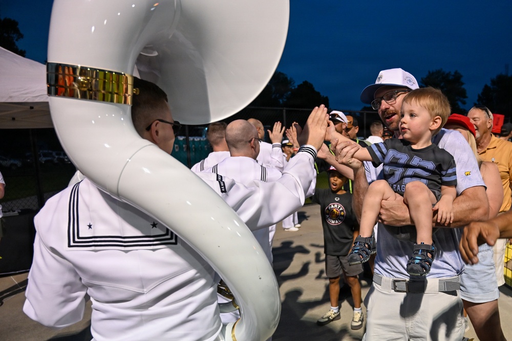 Musician 2nd Class Brady Robinson greets fans at Banana Ball