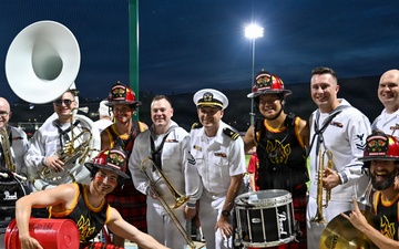 Navy Band Northwest Brass Quintet poses for photo with Fireline Drumline at Banana Ball