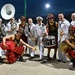 Navy Band Northwest Brass Quintet poses for photo with Fireline Drumline at Banana Ball