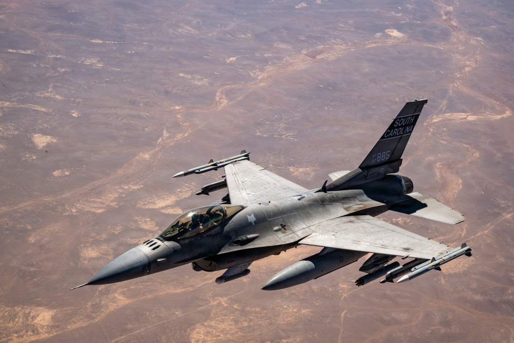 KC-135 refuels F16s for regional deterrence
