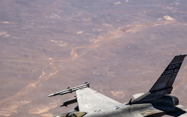 KC-135 refuels F16s for regional deterrence