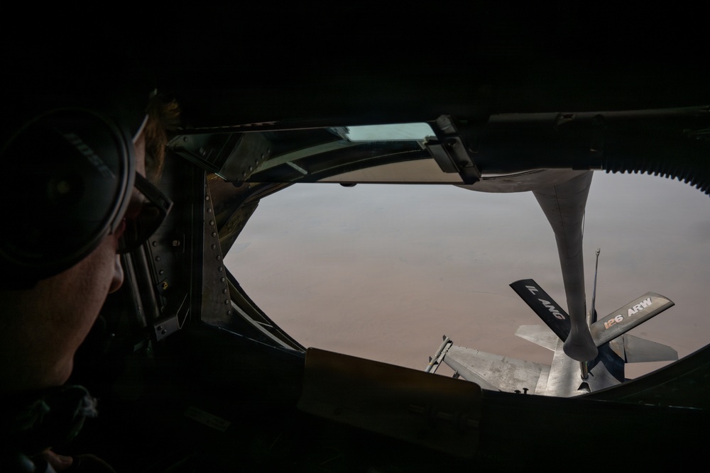 KC-135 refuels F16s for regional deterrence