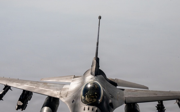 KC-135 refuels F16s for regional deterrence