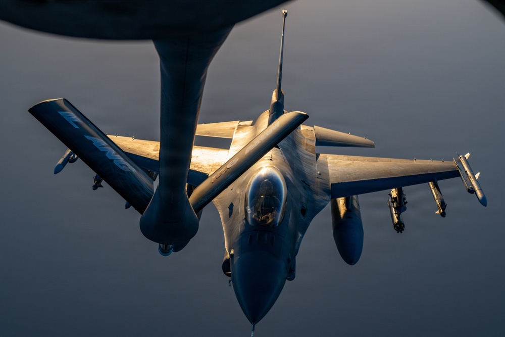 KC-135 refuels F16s for regional deterrence