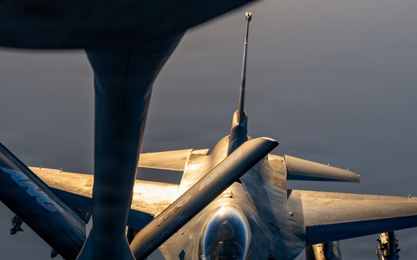 KC-135 refuels F16s for regional deterrence