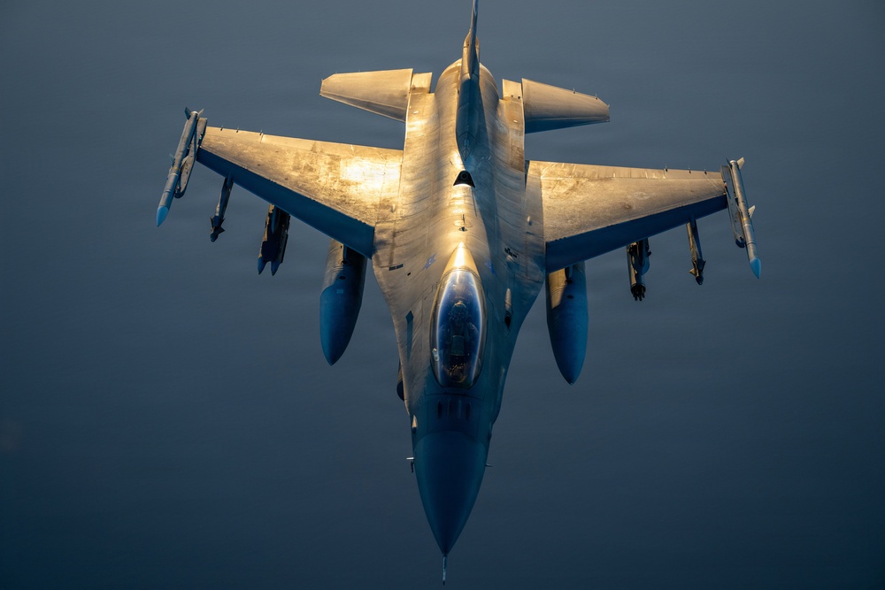 KC-135 refuels F16s for regional deterrence