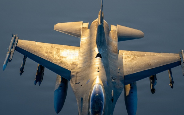 KC-135 refuels F16s for regional deterrence