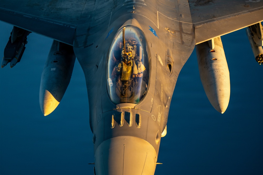KC-135 refuels F16s for regional deterrence