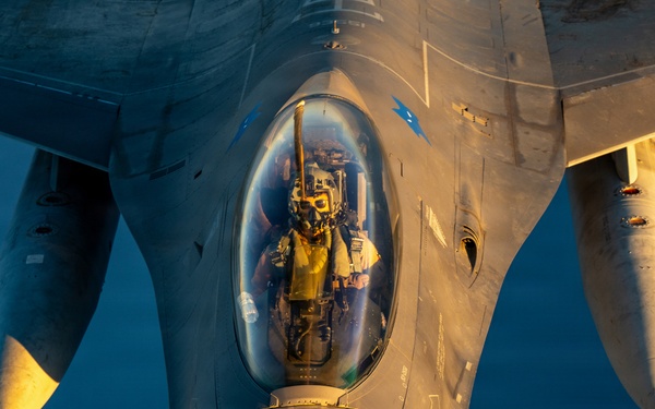 KC-135 refuels F16s for regional deterrence