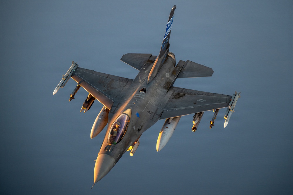 KC-135 refuels F16s for regional deterrence