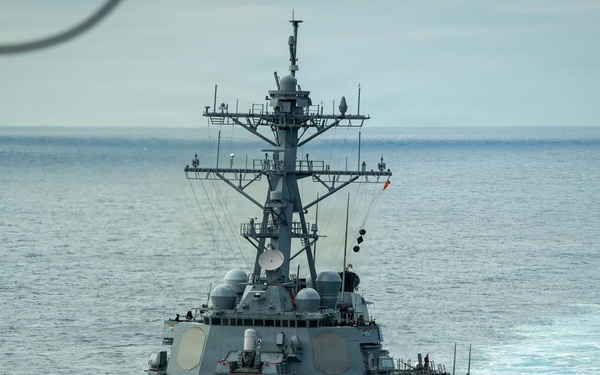USS Carl Vinson (CVN 70) conducts an underway replenishment with USS Barry (DDG 52)