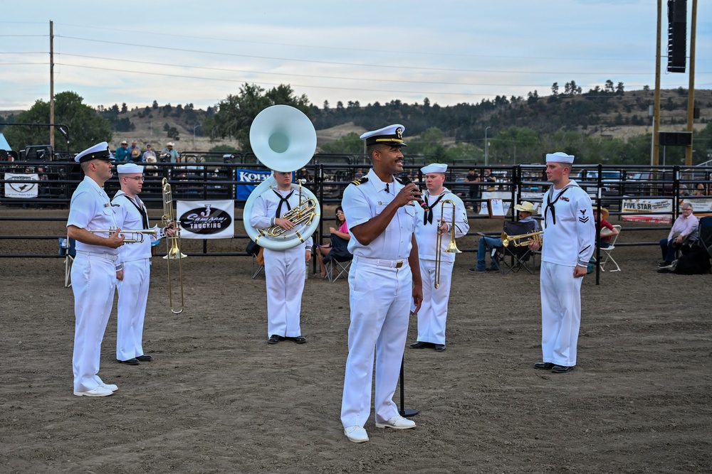 LT Jared Reid-Dixon provides opening remarks before Navy Band Northwest National Anthem performance