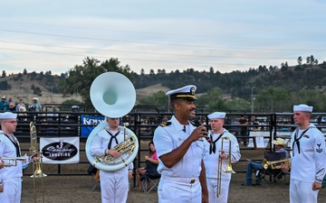 LT Jared Reid-Dixon provides opening remarks before Navy Band Northwest National Anthem performance