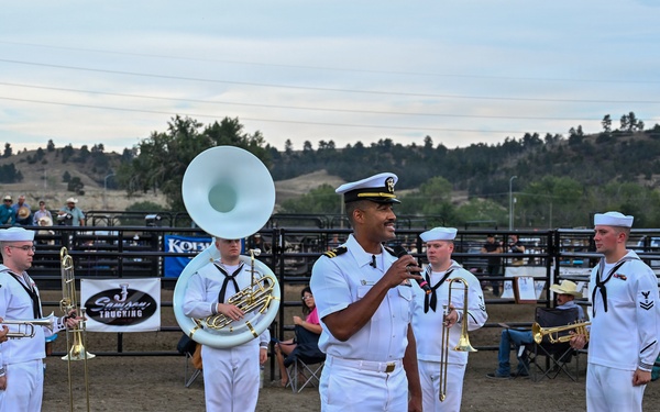 LT Jared Reid-Dixon provides opening remarks before Navy Band Northwest National Anthem performance