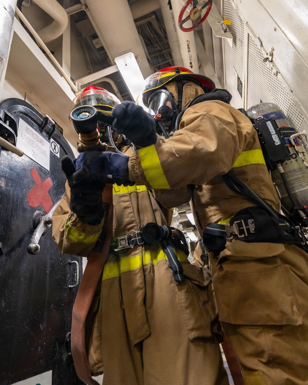 USS Mustin conducts integrated training team drill