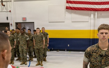 U.S. Marine receives Navy and Marine Corps Achievement Medal during awards ceremony