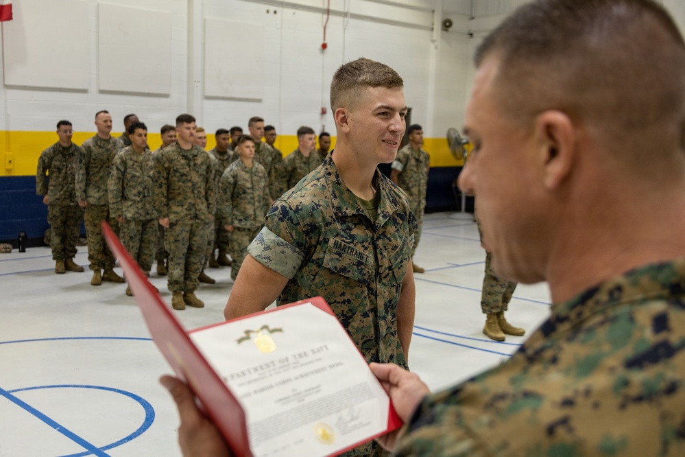 U.S. Marine Receives a Navy and Marine Corps Achievement Medal during an award ceremony