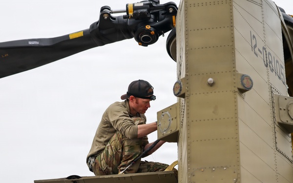 Green Berets, Alaska Army National Guard air crew perform RAPIDS infil to St. Lawrence Island during Operation Polar Dagger