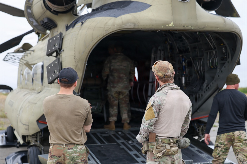Green Berets, Alaska Army National Guard air crew perform RAPIDS infil to St. Lawrence Island during Operation Polar Dagger