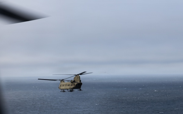 Green Berets, Alaska Army National Guard air crew perform RAPIDS infil to St. Lawrence Island during Operation Polar Dagger