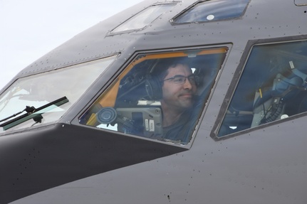 Lt. Col. Jeffrey Boesche of the 168th Wing looks out the window of a KC-135 Stratotanker as he checks engines during preflight inspections during a multiday flyaway readiness exercise at Volk Field, Wisconsin, April 1-7, 2023.