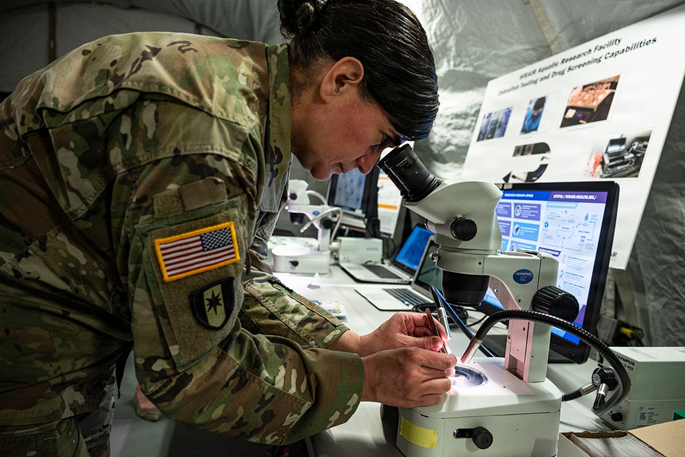 U.S. Army Medical Development teams demonstrate latest tech to Dwight D. Eisenhower School visitors.