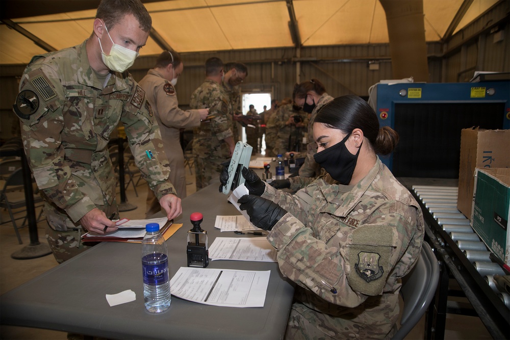 380th AEW executes COVID-19 prevention measures during deployment in-processing