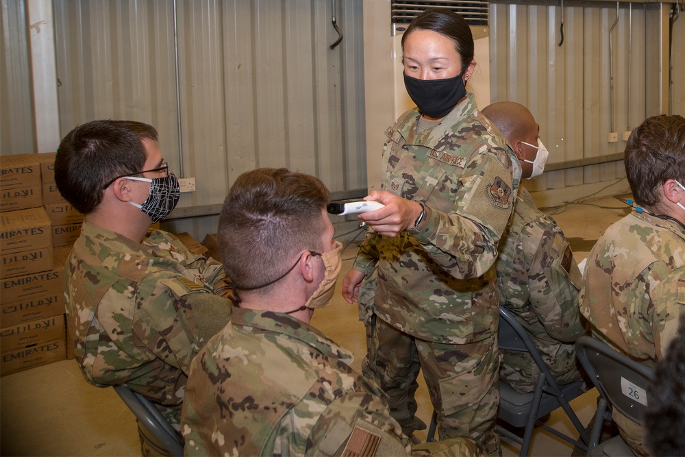 380th AEW executes COVID-19 prevention measures during deployment in-processing